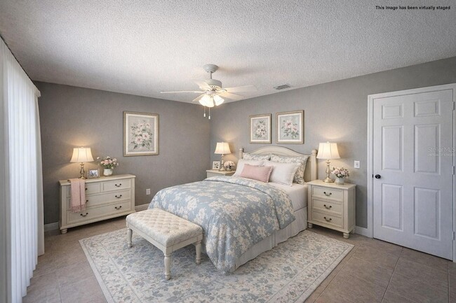 Building Photo - 6525 Manila Palm Way