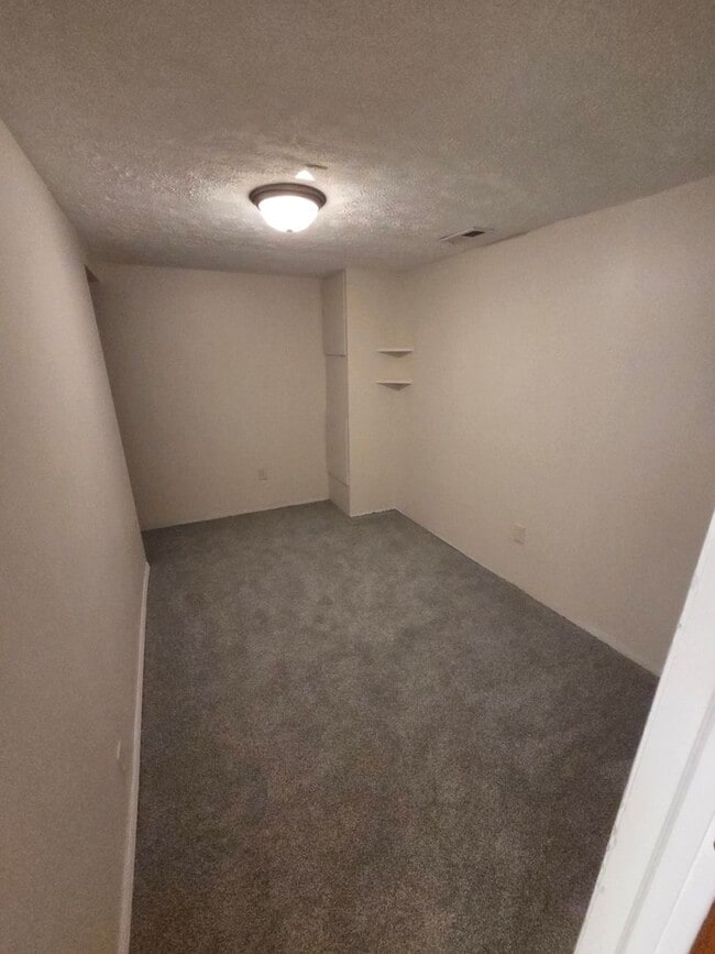 Building Photo - Newly remodeled 4/2/2 with fenced in backyard