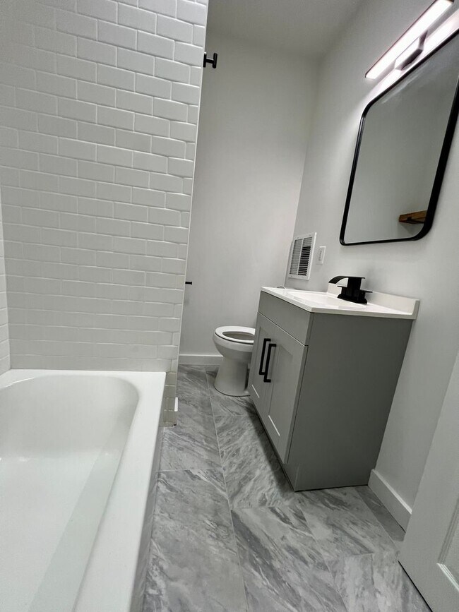 Building Photo - Newly Renovated 3-Bedroom Townhouse in Elmwood Park! Available mid-May! PHA VOUCHERS ACCEPTED!