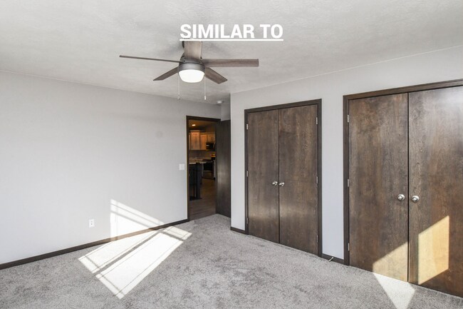 Building Photo - East Sioux Falls 4-Bedroom Townhome – Style, Space & Convenience!