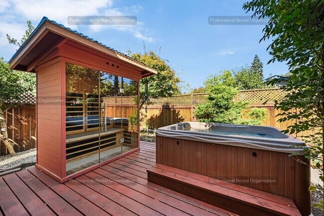 Building Photo - Look No Further, this home has it all- Hot Tub, Sauna, EV Charger, Solar, KOI Pond & More