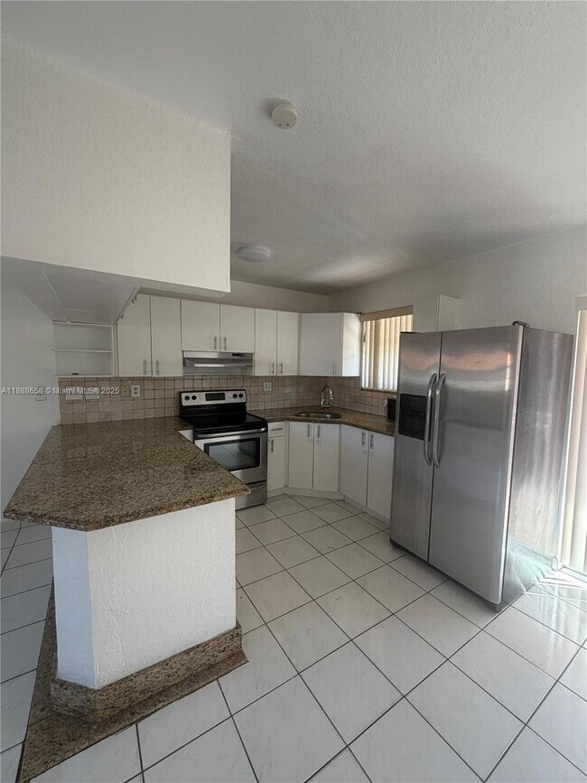 Building Photo - 6951 W 29th Ave