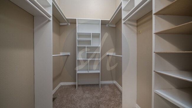 Building Photo - Spacious 3BR Townhome with 2-Car Garage & Private Covered Balcony