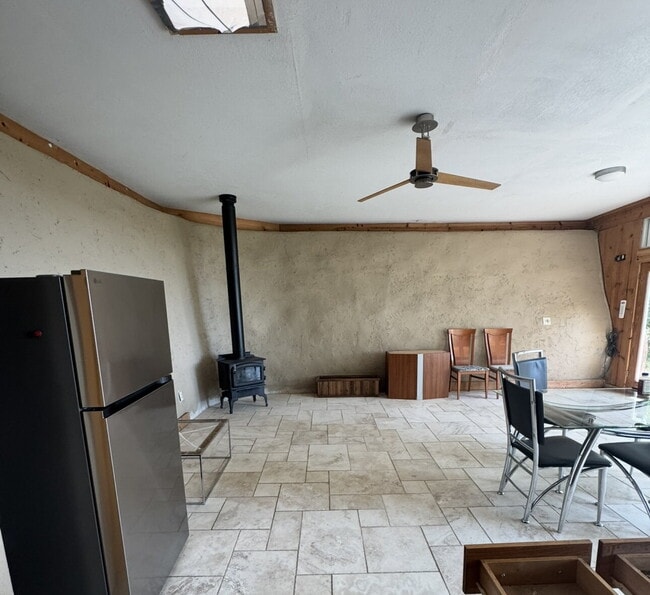 Building Photo - Rare & Beautifully Crafted Earthship Cabin...