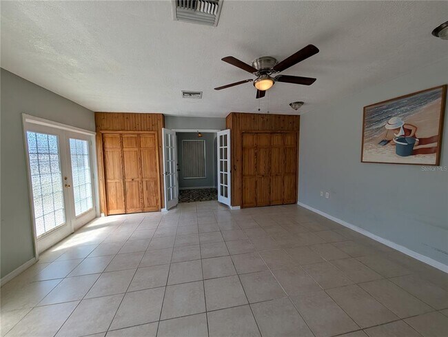 Building Photo - 6947 Bottle Brush Dr