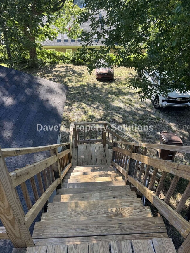 Building Photo - Move-In Ready Upstairs Unit | New Flooring, Eat-In Kitchen & Tons of Closets