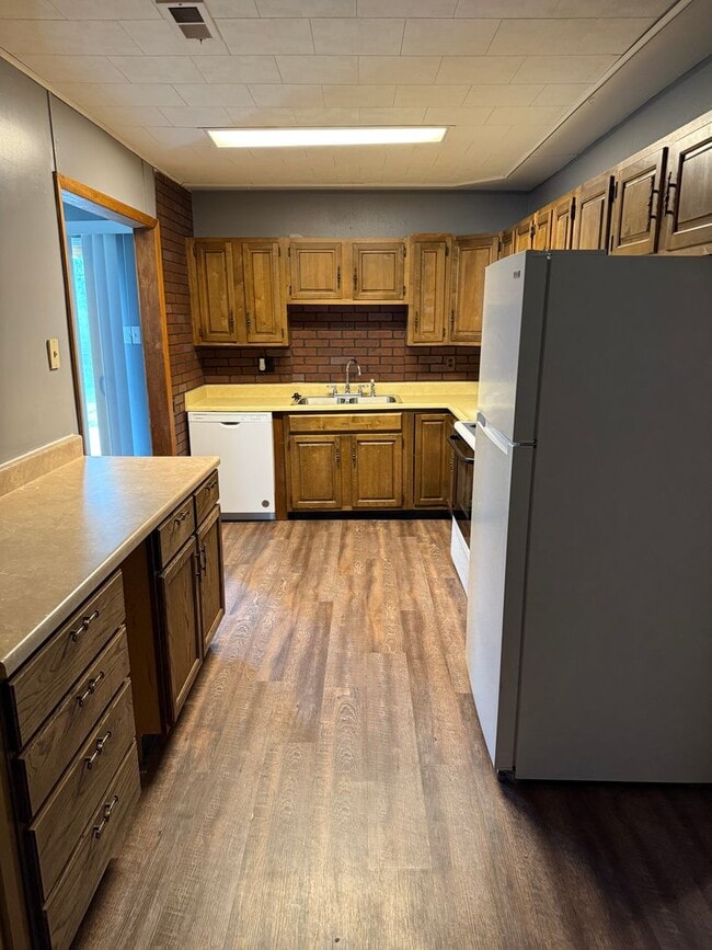Building Photo - 3BR/1BA with overside detached garage read...