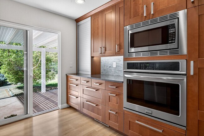 Building Photo - 2,003 Sq Ft Modern 4BR/2BA: Solar, EV Charging & Private Orchard!