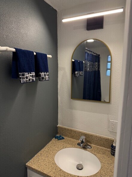 Bathroom Vanity - Eldo Suites Apartments