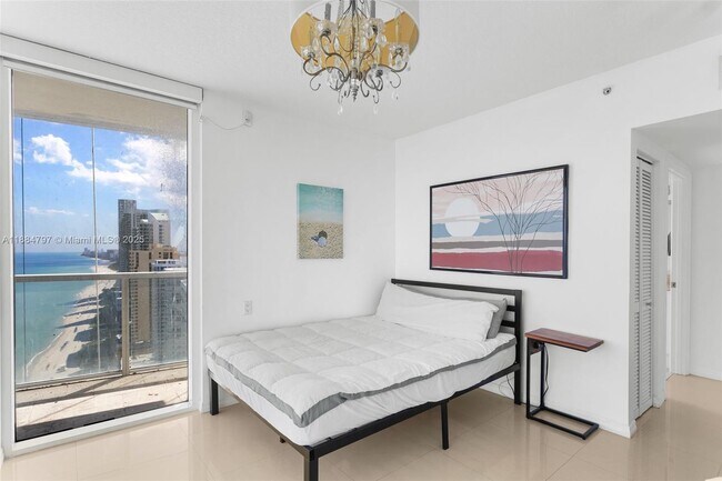 Building Photo - 16699 Collins Ave