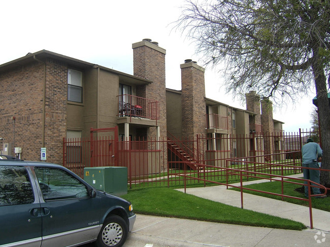 Primary Photo - Pine Oaks Apartments