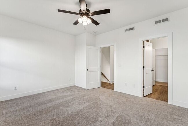 Building Photo - High-End 2BR Townhome | Rooftop Terrace + 2-Car Garage | 24-Unit Commnity