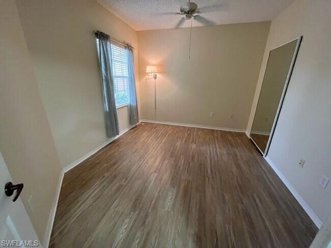 Building Photo - Gardens at Beachwalk - Unit 111