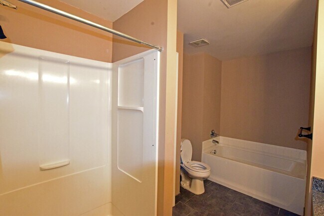 Building Photo - 3-Bedroom, 2-Bath, 2-Car Garage Condo, Ste...