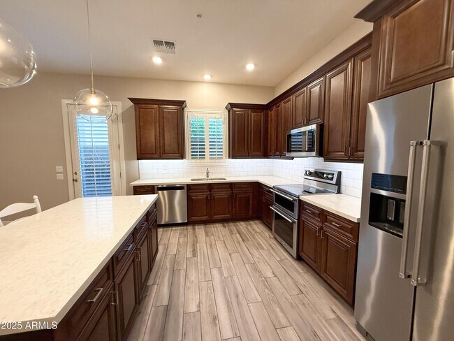 Building Photo - 8976 N 8th Dr