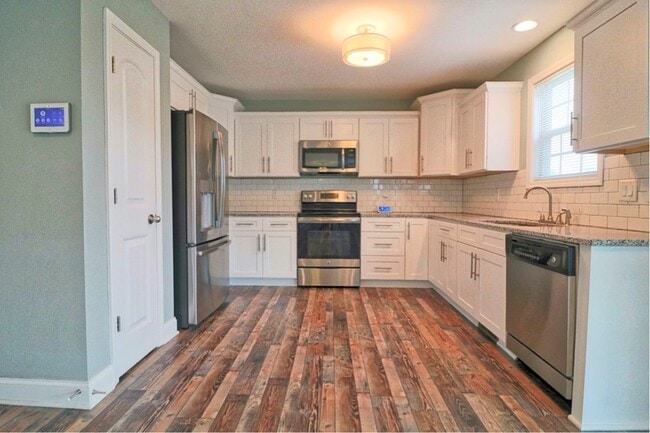 Building Photo - 1201 Morstead Dr