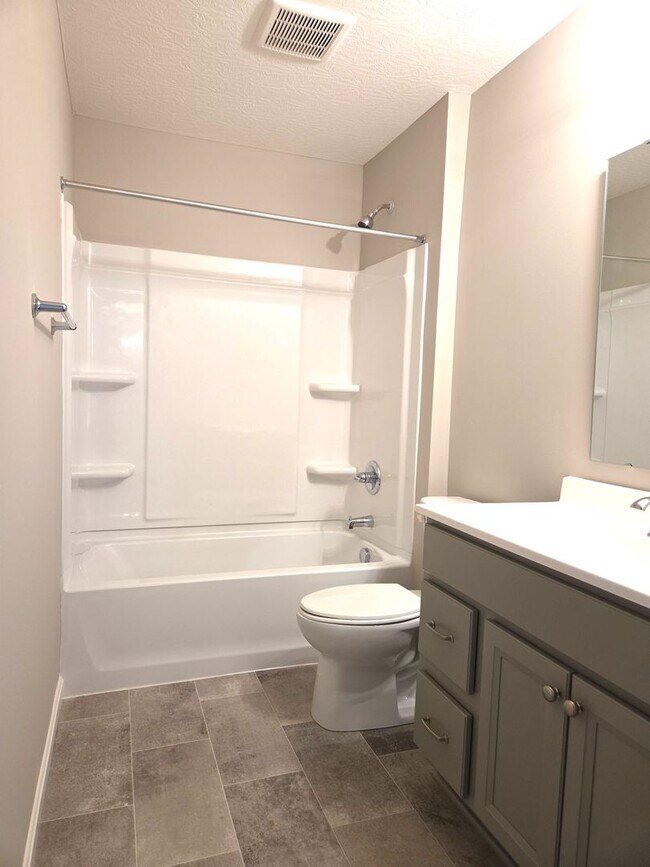 Building Photo - Exquisite just built condo with everything! Ground floor, no stairs, attached garage