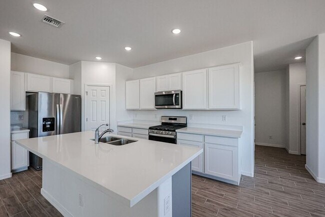 Building Photo - HOME IN LAVEEN! 4 BED 3.5 BA 3 CAR GARAGE!...