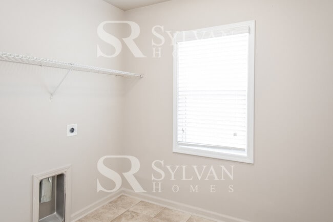 Building Photo - Embrace the charm of this 4 BR, 2.5 BA home