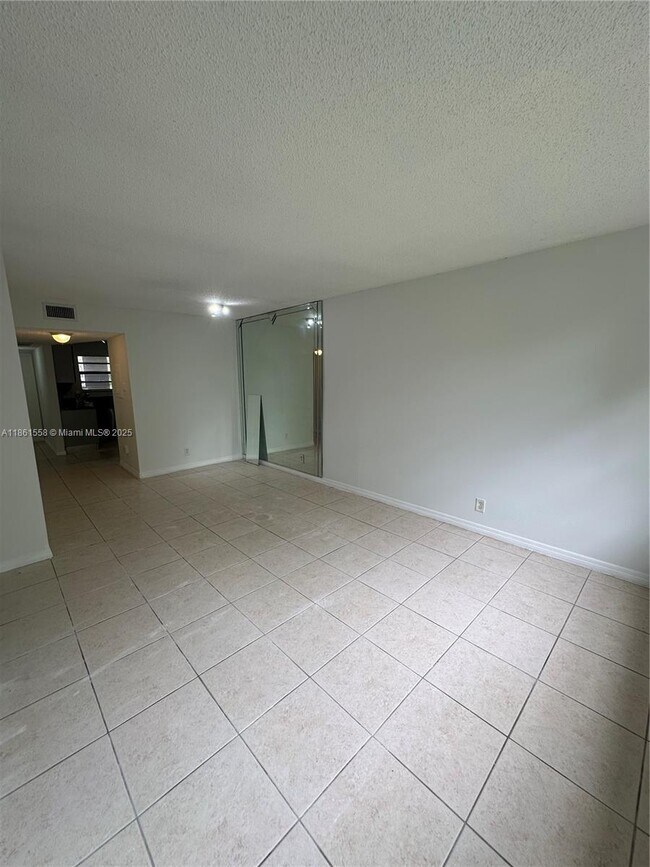 Building Photo - 11213 Royal Palm Blvd