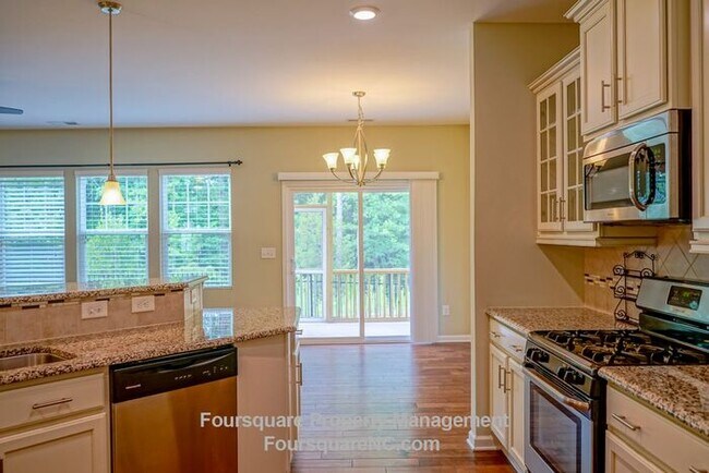 Building Photo - Charming End-Unit Townhome with Bonus Room, Screened Porch & 2-Car Garage – Convenient to RTP, RD...