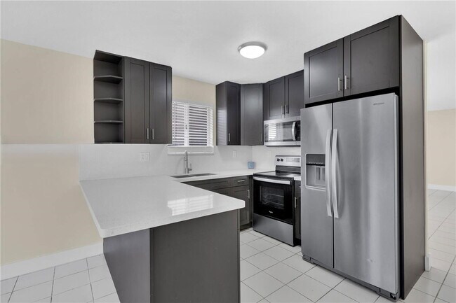 Building Photo - 16215 SW 137th Ct