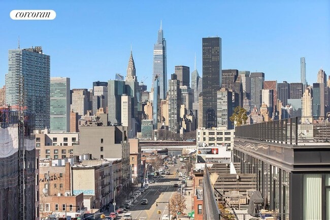 Building Photo - 21-59 44th Drive 2C