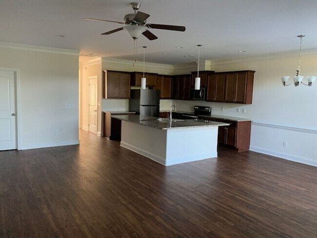 Building Photo - Stunning Brick Townhome with Garage in Tre...