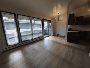 Building Photo - North Seattle 1BR with Private Balcony, Natural Light, and Modern Flooring