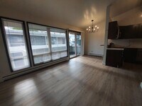 Building Photo - North Seattle 1BR with Private Balcony, Natural Light, and Modern Flooring
