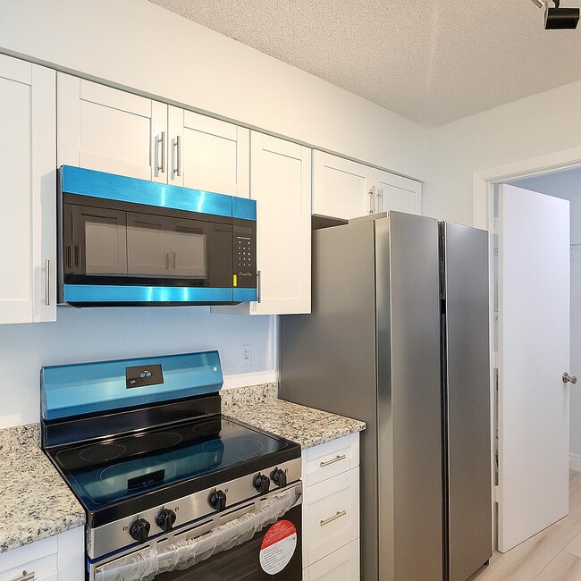 Building Photo - 4055 NW Cinnamon Tree Cir
