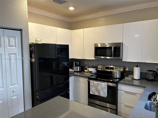 Building Photo - 10371 West 33rd Ct