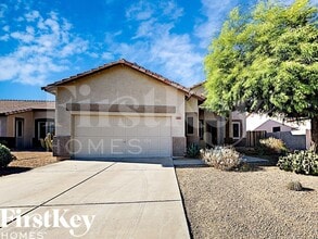 Building Photo - 13702 W Tara Ln