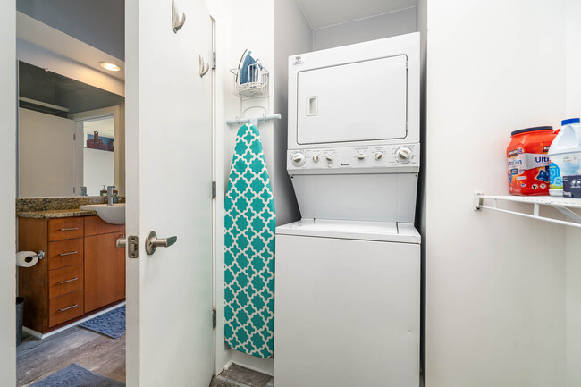 Large walk-in closet with washer, dryer, iron and ironing board (laundry supplies included) - 525 E 6th Street