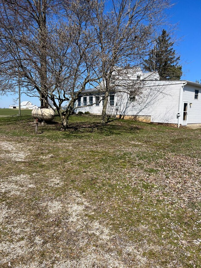 Building Photo - Country living! 1st floor laundry 3+ car garage with work shop