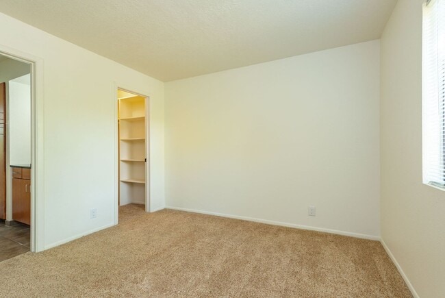 Building Photo - Light and Bright Second Level Condo Available Now!