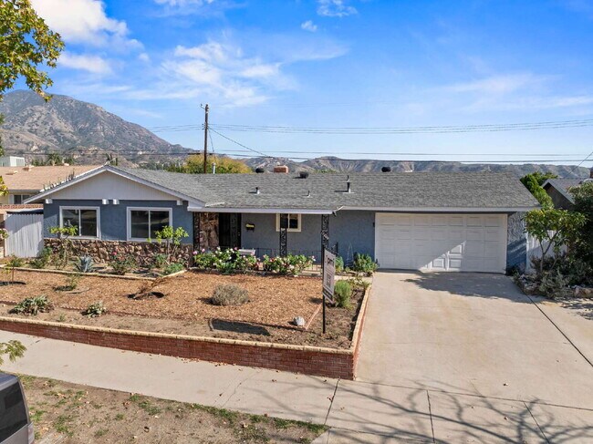 Building Photo - "Charming 3-Bedroom Sylmar Home with Cozy ...