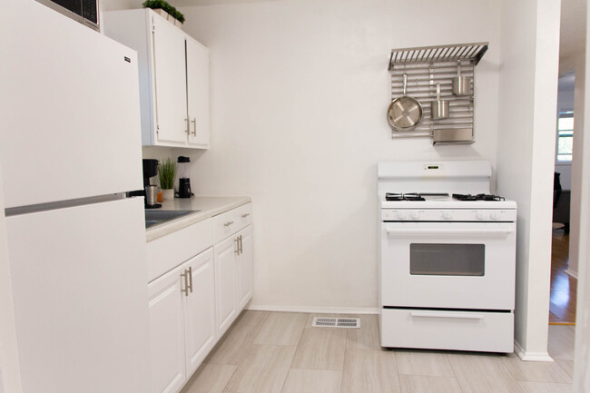 Kitchen with view from fridge. - 100 Beaver St