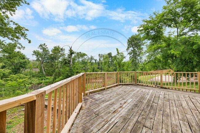Building Photo - Four Bedroom Two Story with Two Car Garage...