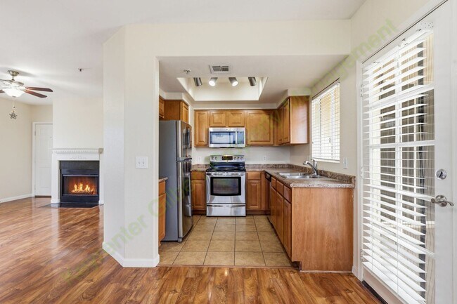 Building Photo - Freshly Updated 2-Bedroom Condo in Gated Lakeshore at Andersen Springs – New Paint & New Carpet!