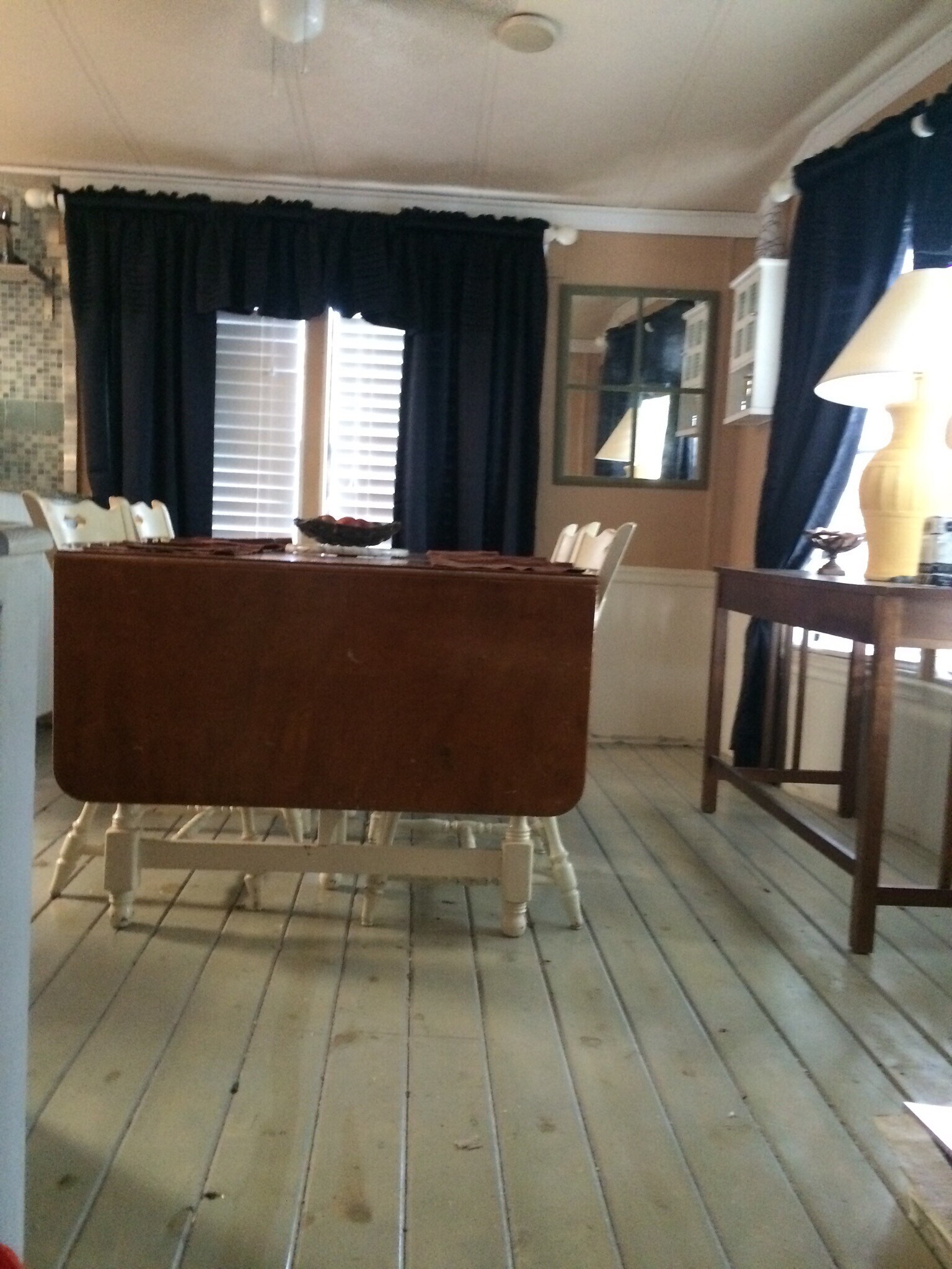 Dining room area. Home has tile and wood flooring. - 3000 Clarcona Road