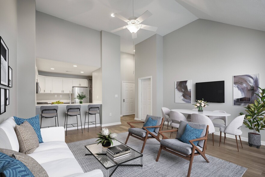 Living dining area looking into the kitchen and front door - Avana Marlborough