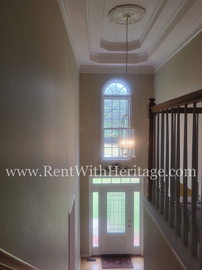 Building Photo - Gorgeous 3-Story Brick Home / 2 Fireplaces / Full Finished Basement / Chapel Hill Schools
