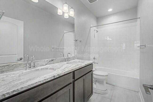 Building Photo - 21087 E 62nd Dr