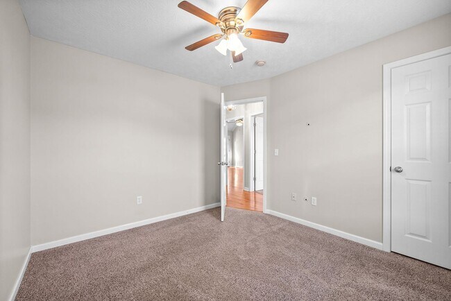 Building Photo - Pet Friendly Three Bedroom with Bonus!