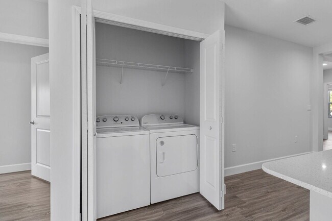 Building Photo - "Charming 3-Bed, 2-Bath Duplex Gem in Port Charlotte - Your Ideal Home Awaits!"