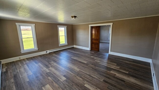 Building Photo - Country Living in This 4 Bedroom Farmhouse!