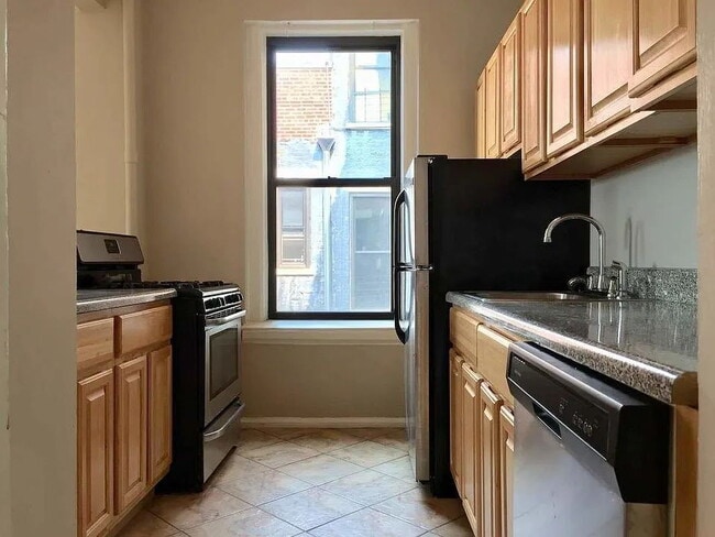 Building Photo - "Charming 1-Bedroom Retreat in Vibrant New York Locale – Your Perfect Urban Sanctuary!"