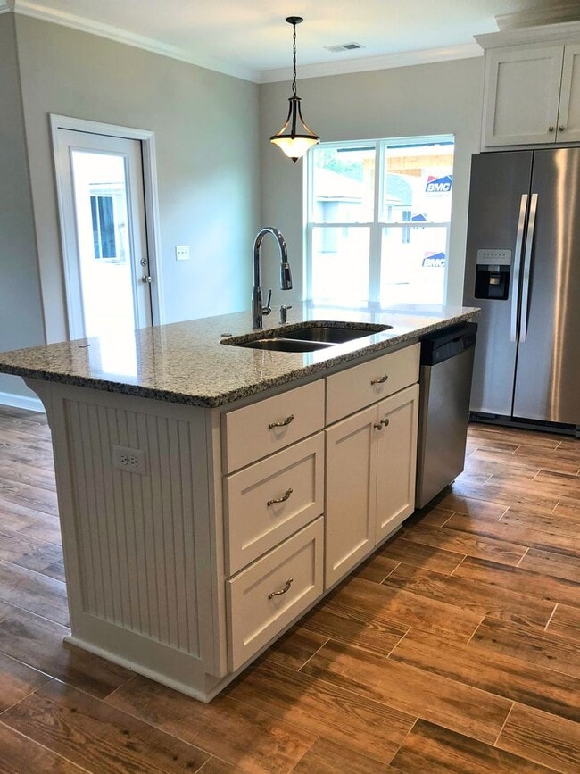 Building Photo - 3/2 with landscaping included!