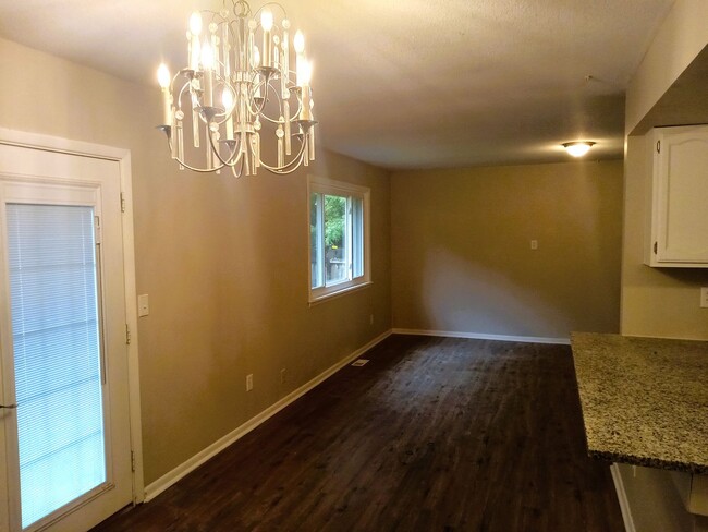 Building Photo - Darling Home in Bel Aire - Finished Baseme...